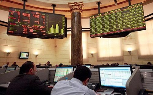   مصر اليوم - إيقاف سهم أوراسكوم في البورصة بسبب صفقة لافارج